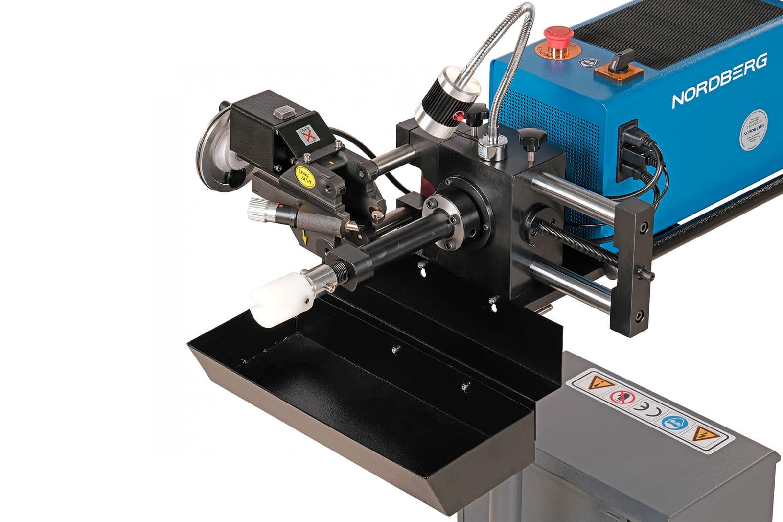 Крупный план режущей головки станка NORDBERG NL1